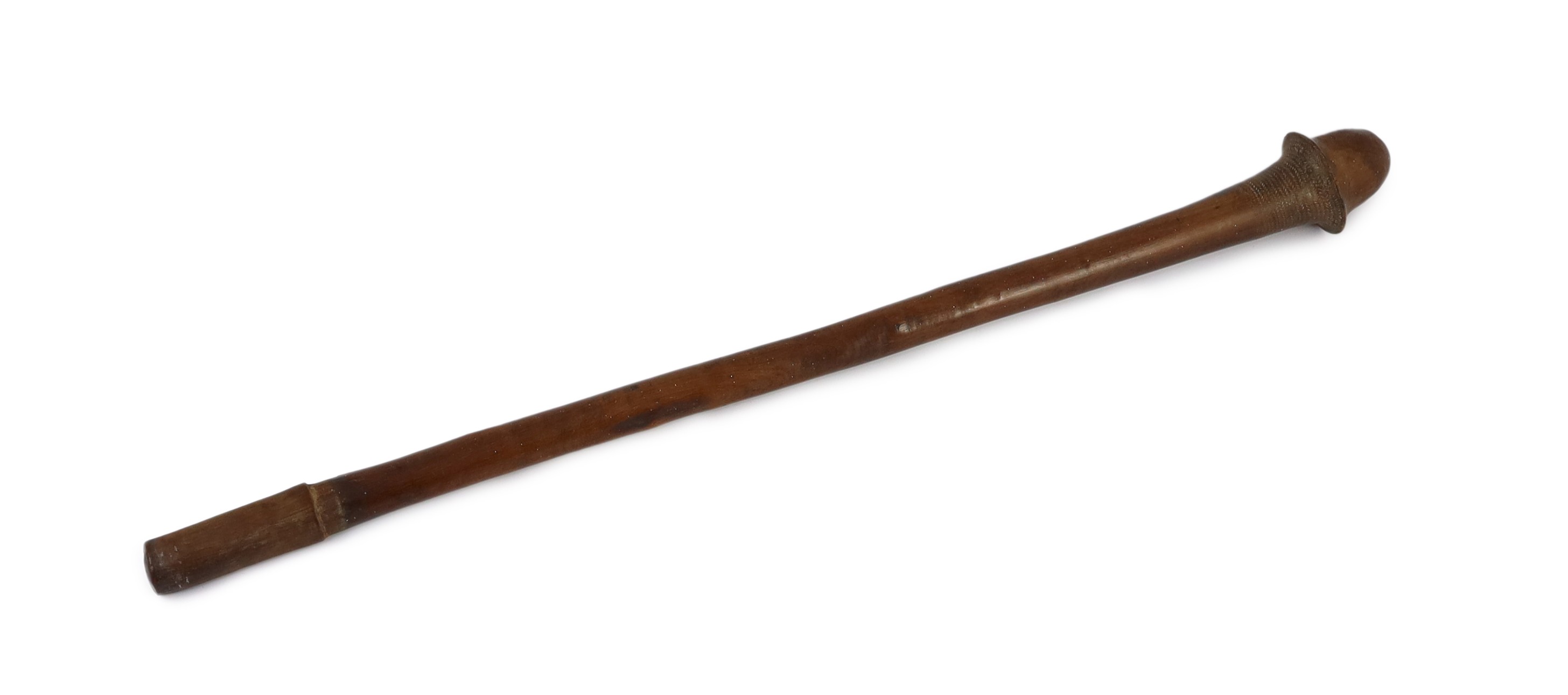 A South Sea Island hardwood war club, with chevron banded engraving beneath the head and unpolished handle, 79cm long